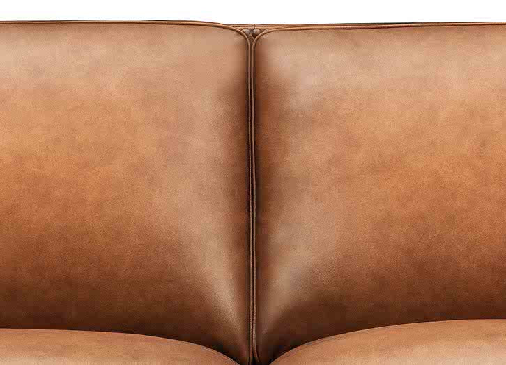 Close-up of a brown leather sofa
