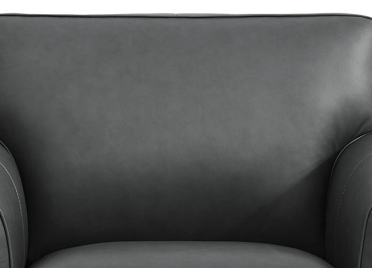 Close-up of a dark gray leather armchair