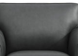 Close-up of a dark gray leather armchair