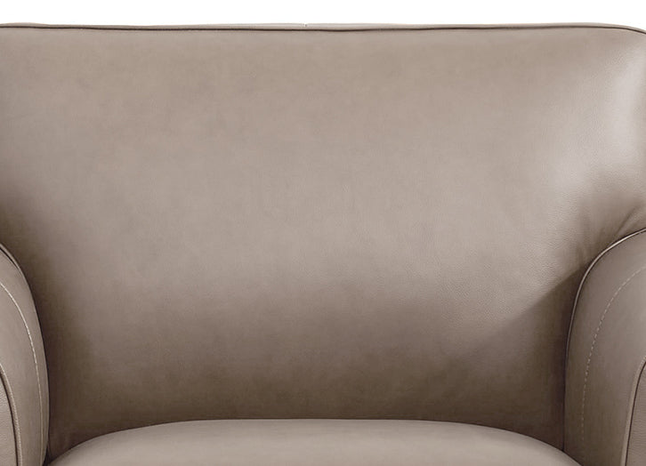 Close-up of a beige leather armchair