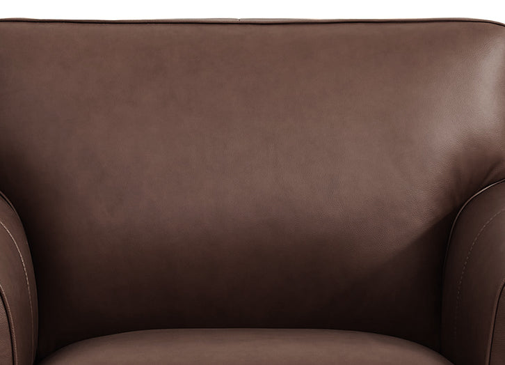 Close-up of a brown leather armchair