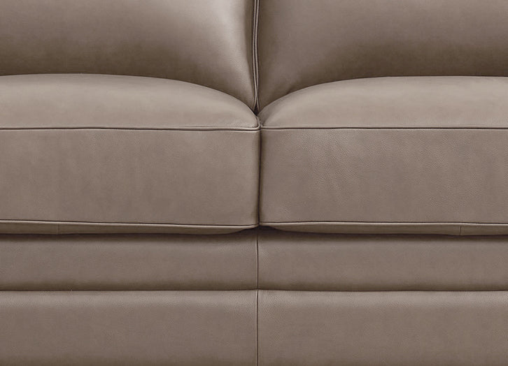 Close-up of a beige leather sofa