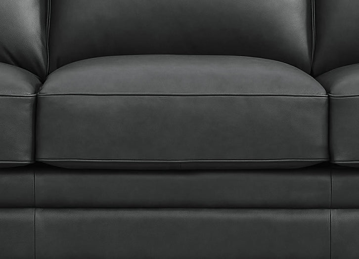 Close-up of a black leather sofa