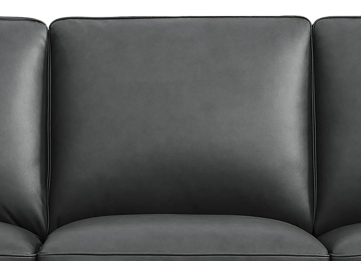 Close-up of a black leather sofa