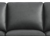Close-up of a black leather sofa