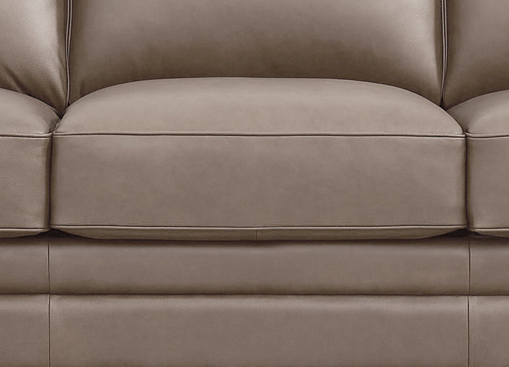 Close-up of a beige leather sofa