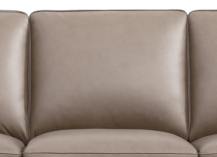 Close-up of a brown leather sofa
