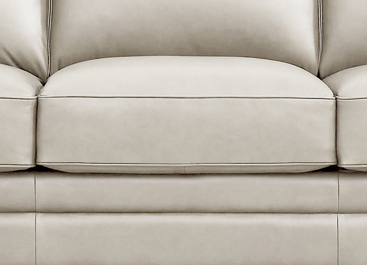 Close-up of a beige leather sofa