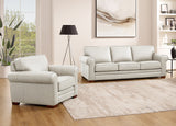 Light gray sofa and armchair set in a living room with decor elements.