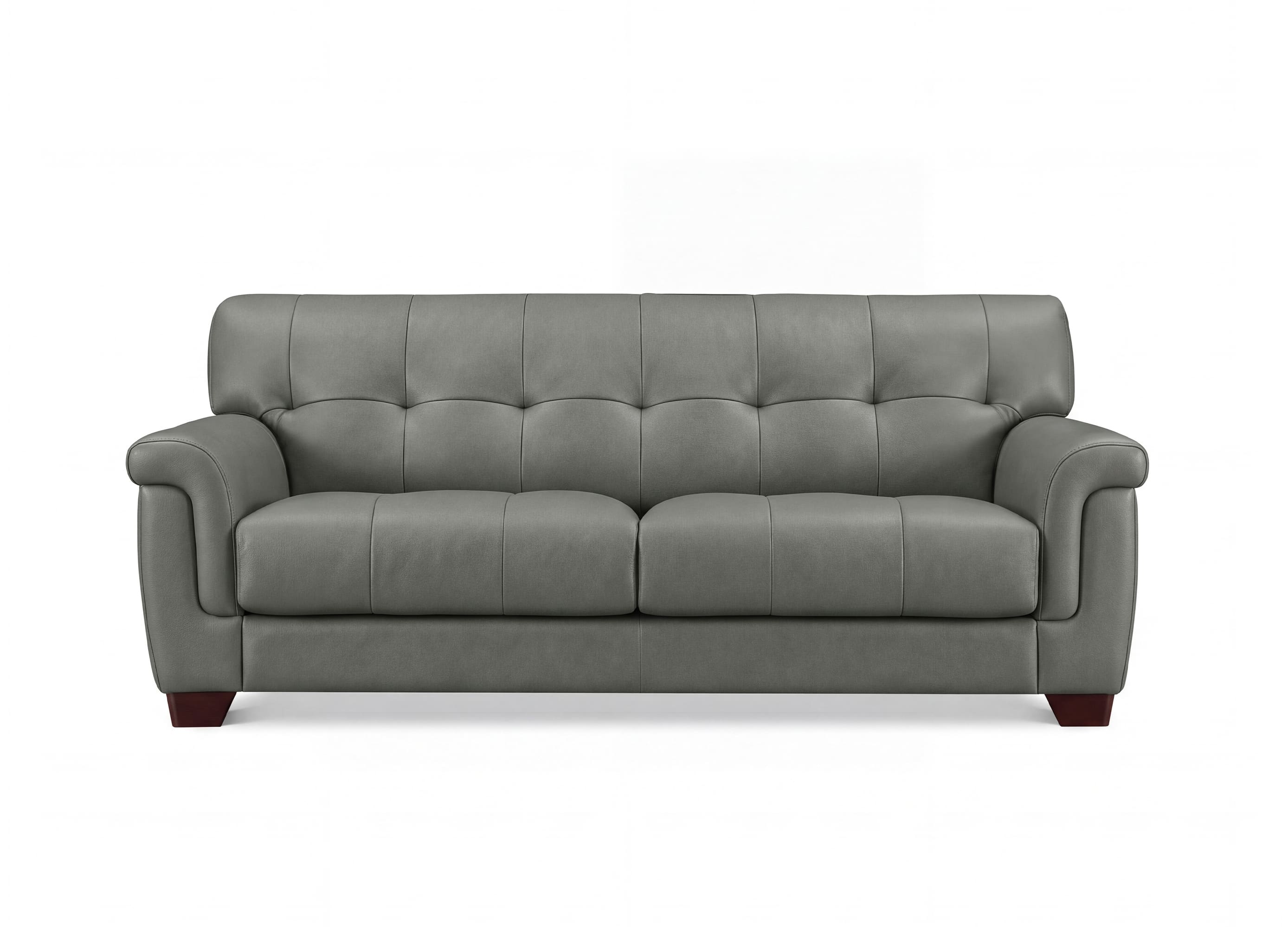 A gray tufted leather sofa with rolled arms and short dark wood legs, shown against a plain white background.