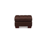 A dark brown tufted leather ottoman with blocky legs, shown from the front against a plain white background.