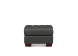 A dark gray tufted ottoman with dark reddish-brown wooden legs, shown from the front against a plain white background.