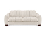 An off-white upholstered loveseat sofa with vertical channel tufting on the backrest and seat cushions, supported by dark brown wooden legs, shown against a plain white background.