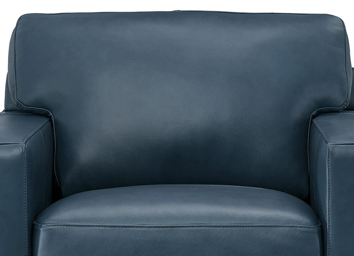 Blue leather armchair with a close-up view of the backrest.