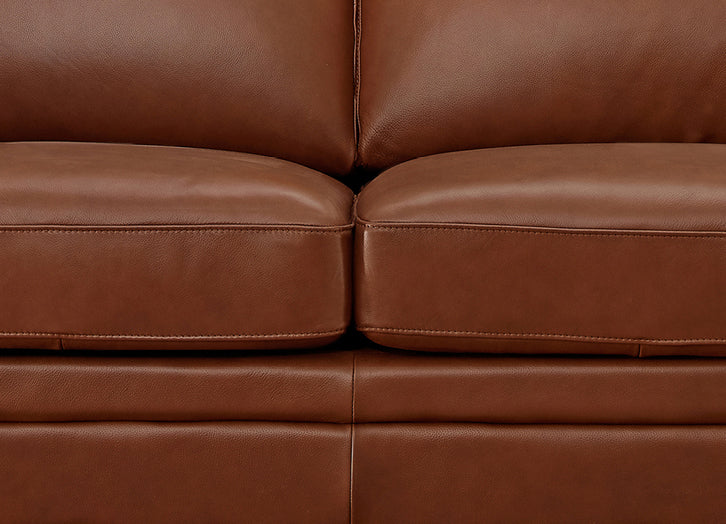Close-up of a brown leather sofa