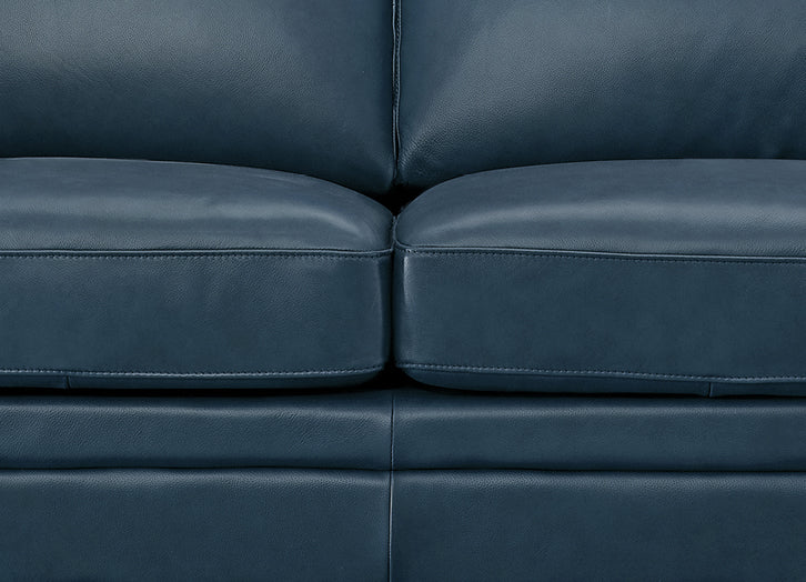 Close-up of a blue leather sofa