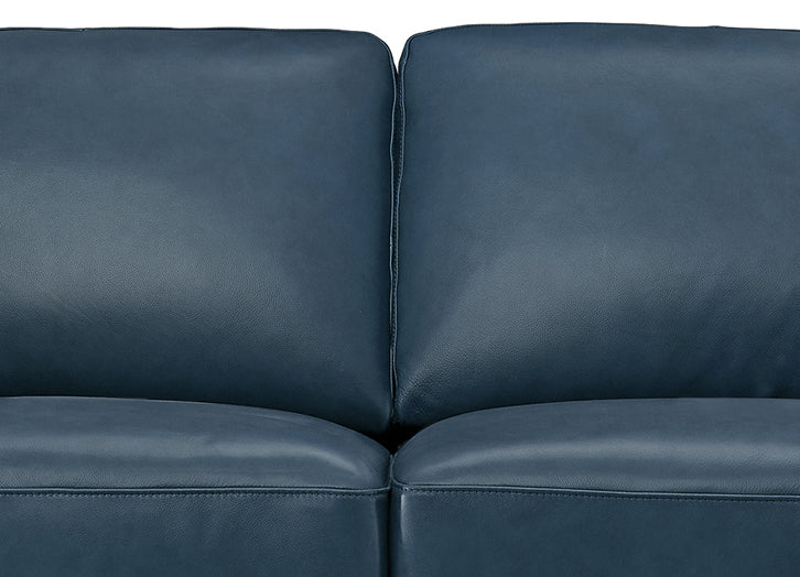 Close-up of a blue leather sofa