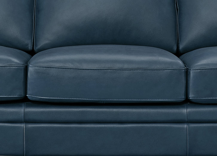 Close-up of a blue leather sofa