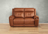 Brown leather sofa on a wooden floor with a gray wall background